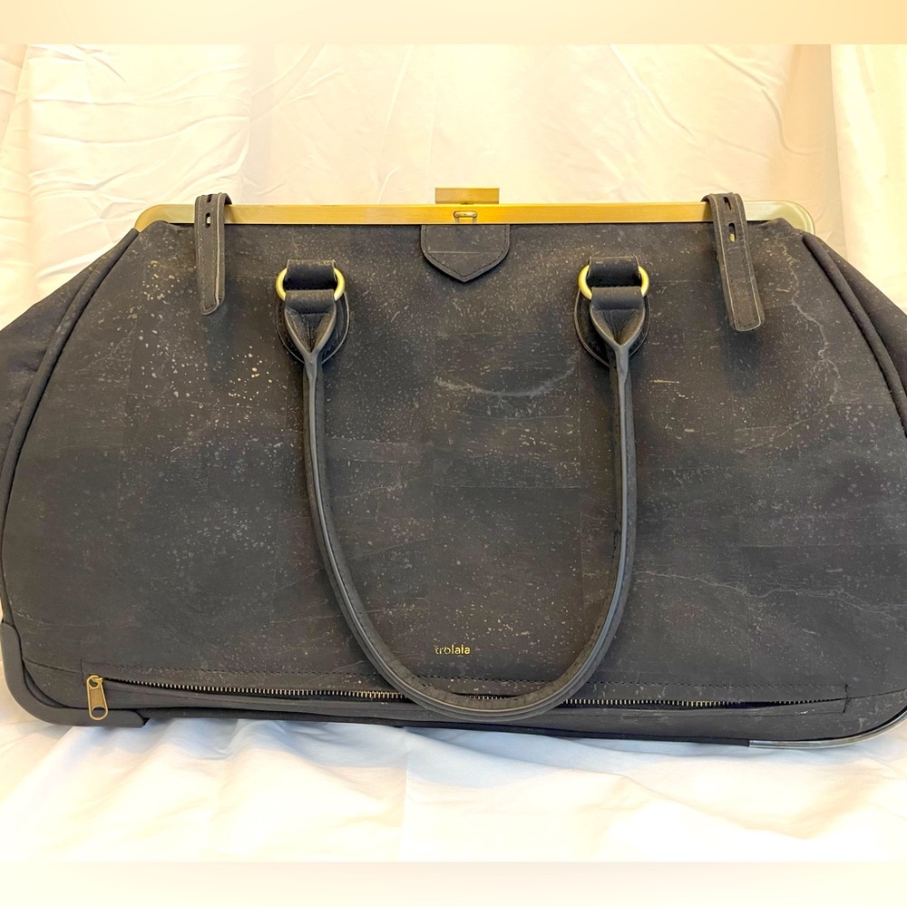 Like new La Flore Paris Trolala Bag including packing cube set.